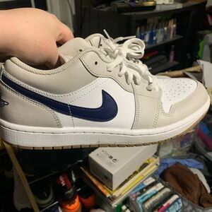 White and Gray Sneakers with Blue Swoosh